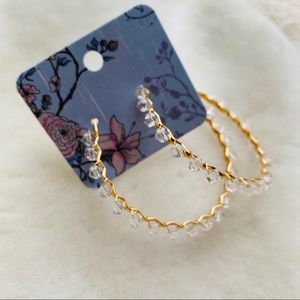 | Crystal Accented Hoop Earrings |